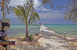 Boat readies to leave the dock at Rum Point for the trip ... by Patrick Reardon 